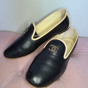 CHANEL Black Leather Loafers with Cream Trim and Gold CC Logo